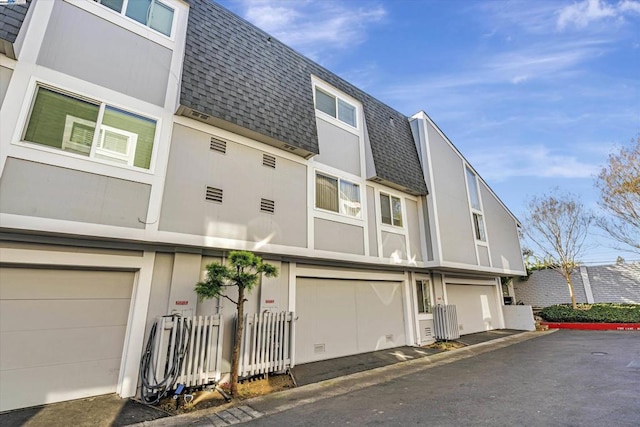 view of home's exterior with a garage