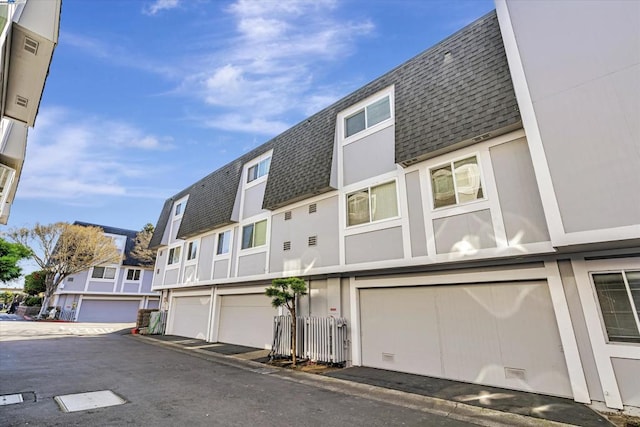 exterior space with a garage