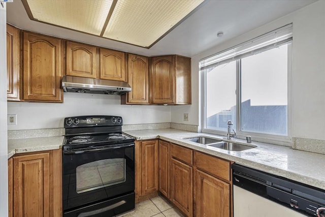 kitchen with light tile patterned floors, dishwasher, sink, and electric range