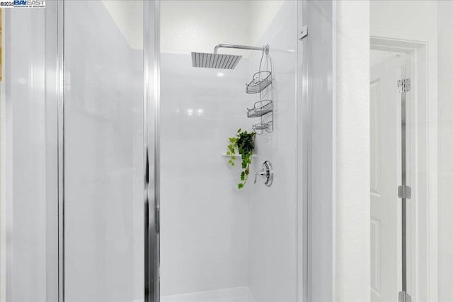 bathroom with walk in shower