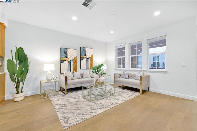 living room featuring light wood-type flooring