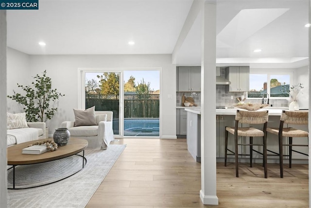 interior space featuring sink and light hardwood / wood-style floors