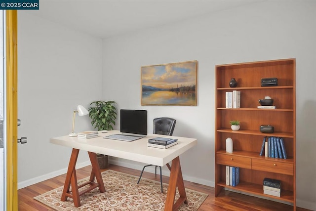 office area with hardwood / wood-style floors