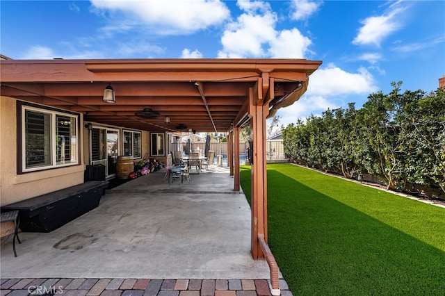 view of patio with ceiling fan