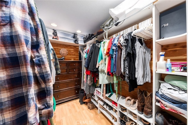 walk in closet featuring hardwood / wood-style floors