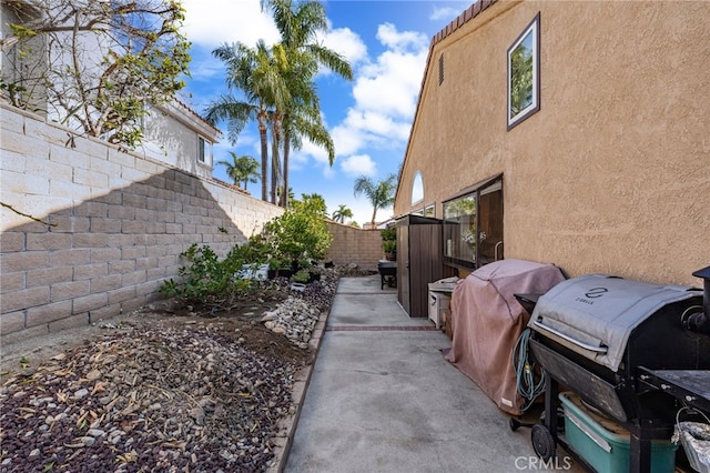 view of home's exterior featuring a patio area