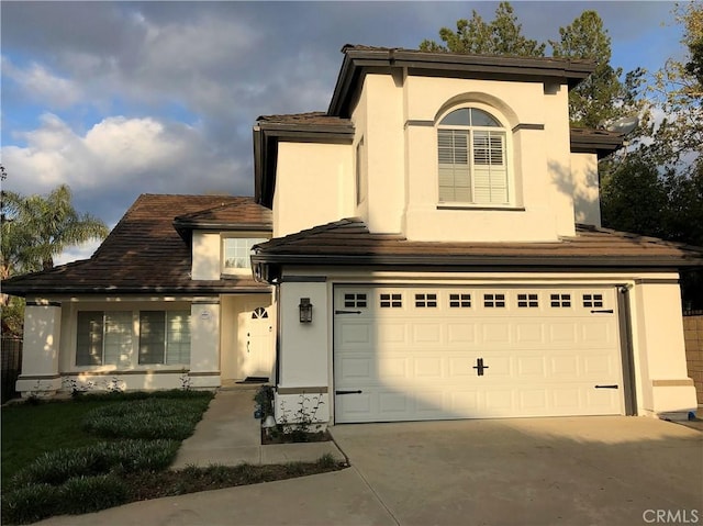 view of front of home with a garage