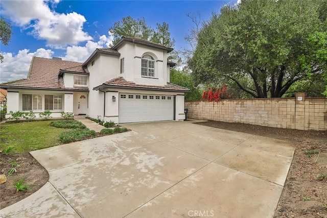 view of front of property with a garage