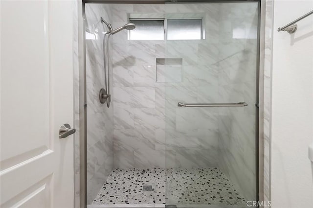 bathroom featuring walk in shower