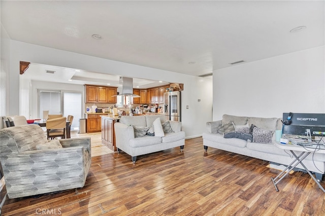 living room with hardwood / wood-style flooring