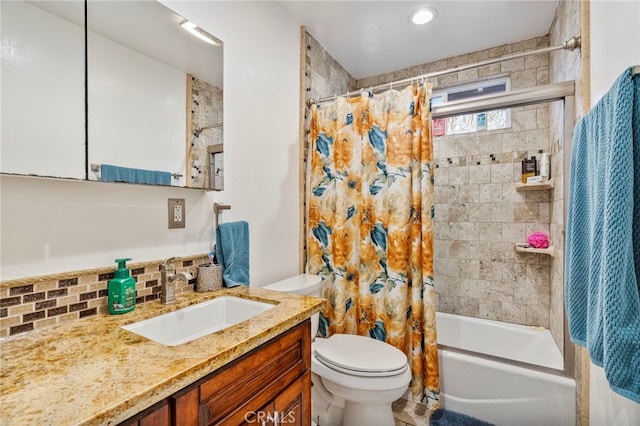 full bathroom featuring shower / bathtub combination with curtain, vanity, toilet, and decorative backsplash