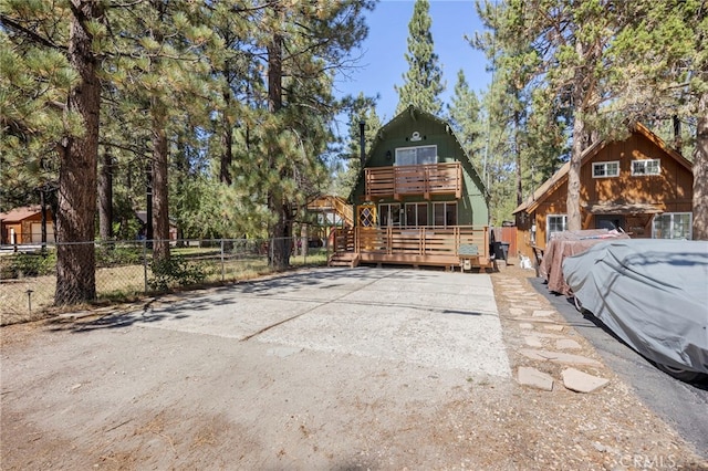 exterior space featuring a wooden deck