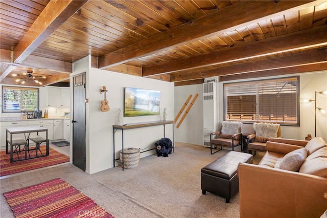 living room featuring beamed ceiling, light colored carpet, ceiling fan, and wooden ceiling