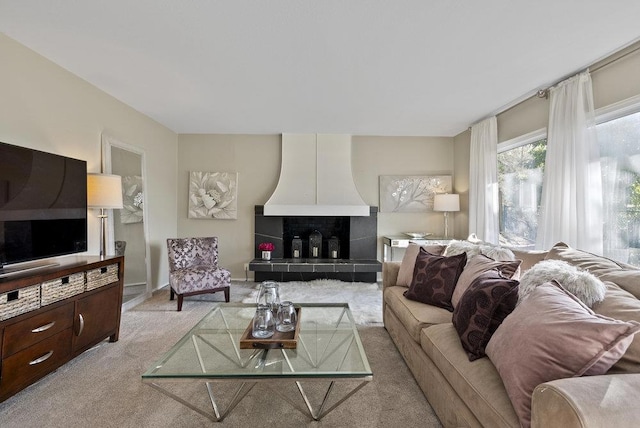 living room featuring light carpet