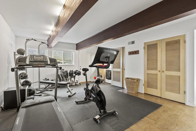 exercise area featuring french doors