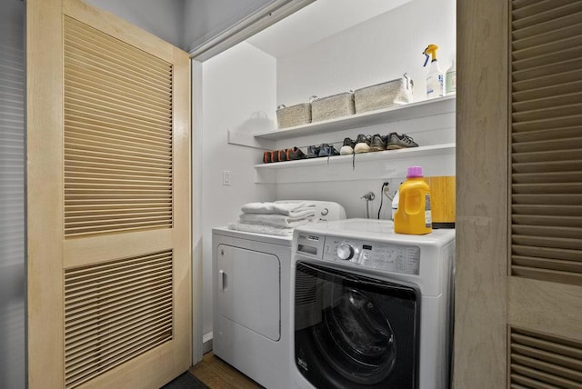 laundry area featuring washing machine and dryer