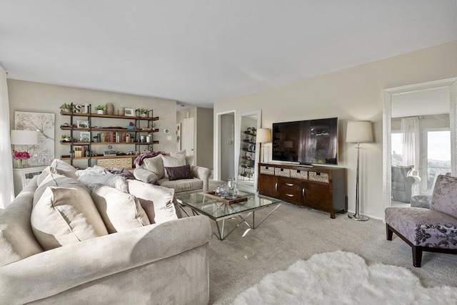 living room featuring light colored carpet