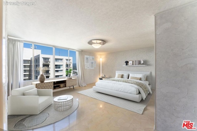 bedroom featuring a textured ceiling