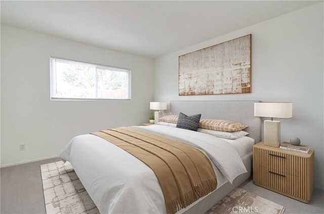 bedroom featuring light carpet