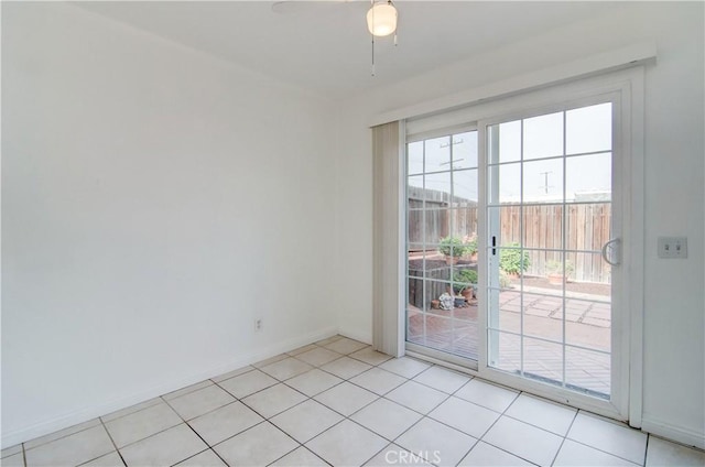 entryway featuring ceiling fan and light tile patterned floors