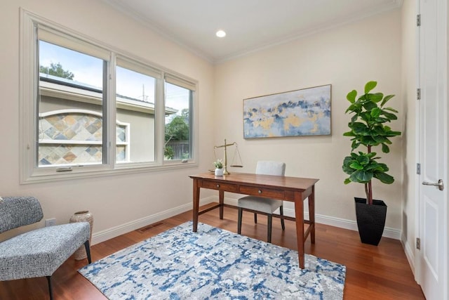 home office with ornamental molding and wood-type flooring