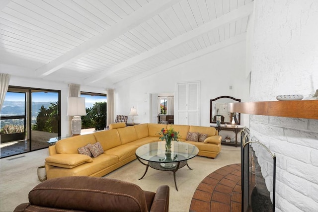 living room with beamed ceiling, light carpet, and high vaulted ceiling