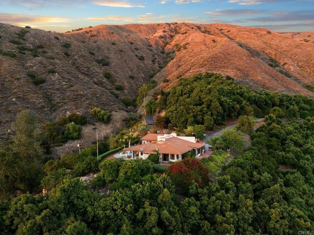 aerial view at dusk with a mountain view