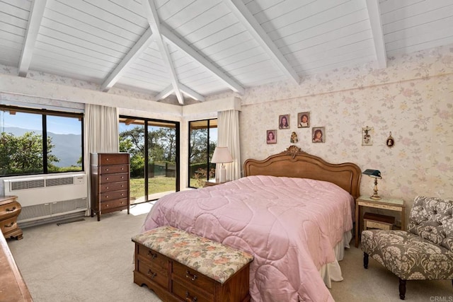 carpeted bedroom with beamed ceiling, radiator heating unit, and access to outside