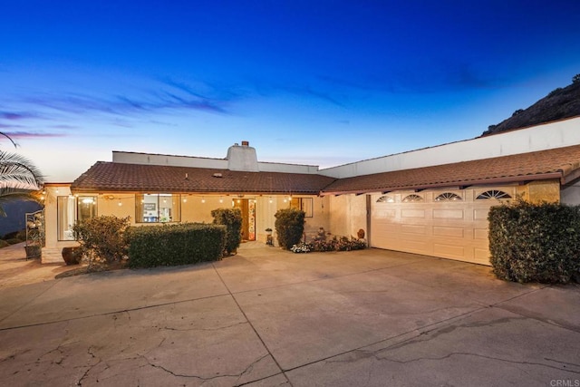 view of front of home featuring a garage