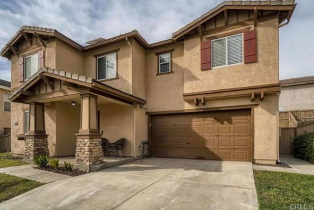 view of front of home with a garage