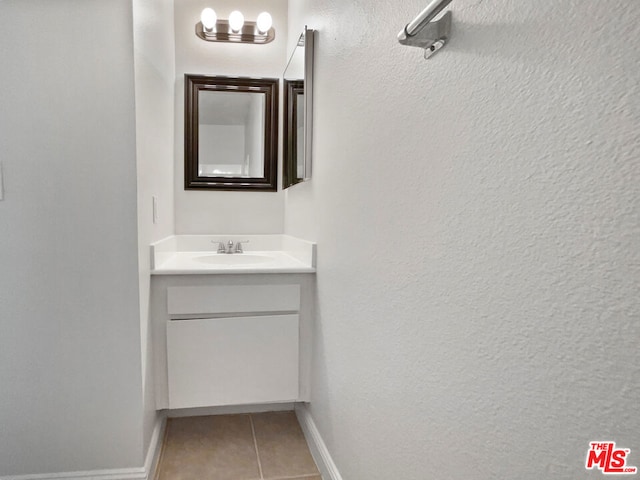 bathroom featuring vanity and tile patterned floors