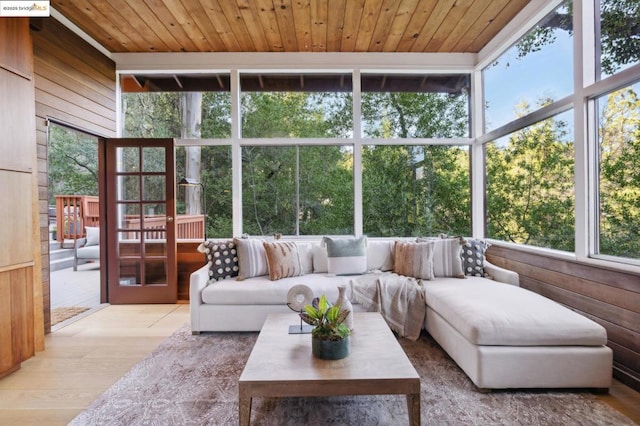 sunroom featuring wooden ceiling