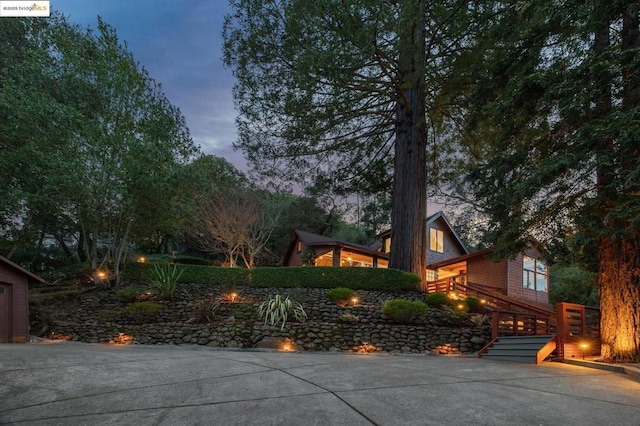 view of property exterior at dusk