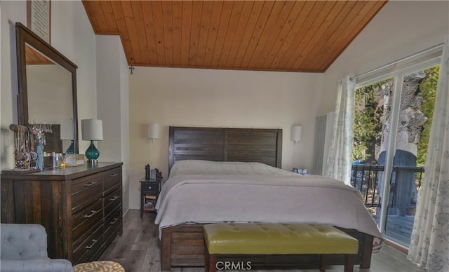 bedroom featuring dark hardwood / wood-style flooring, wood ceiling, access to outside, and lofted ceiling