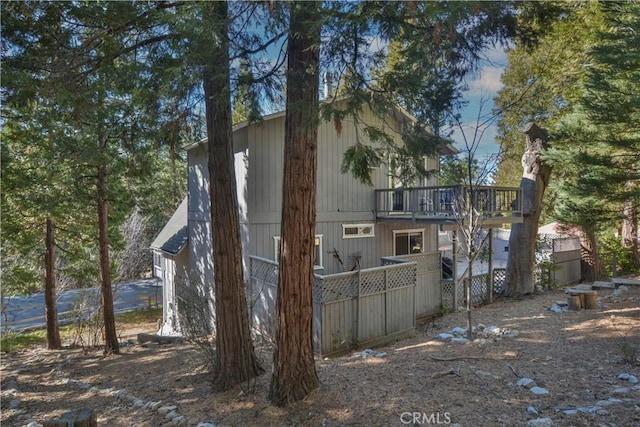 view of property exterior with a balcony