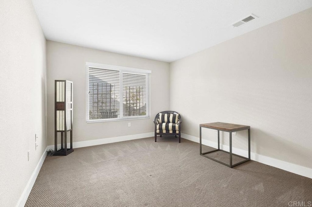 unfurnished room with carpet flooring