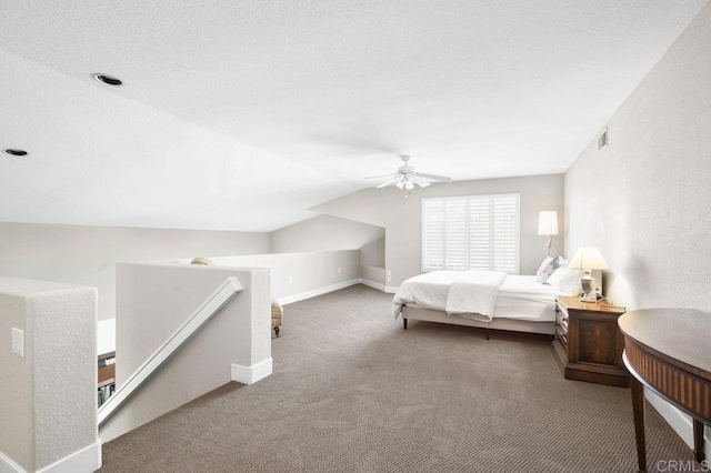 carpeted bedroom with ceiling fan and lofted ceiling