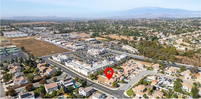 drone / aerial view featuring a mountain view