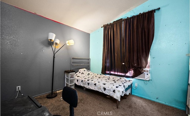 carpeted bedroom featuring lofted ceiling and cooling unit