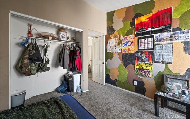 carpeted bedroom with a closet