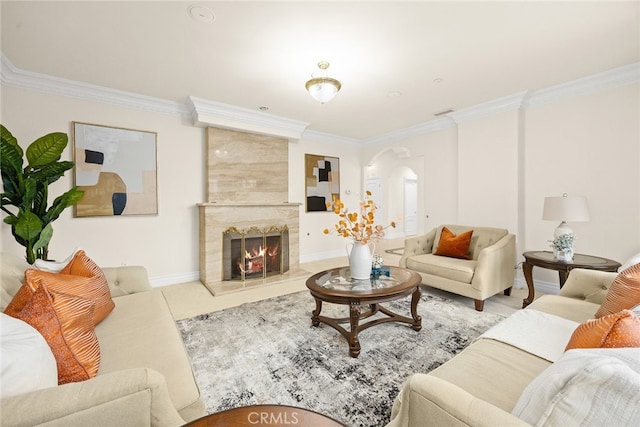 living room with a fireplace and ornamental molding