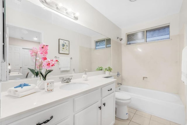 full bathroom featuring vanity, tub / shower combination, tile patterned floors, and toilet