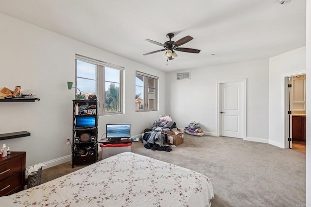 carpeted bedroom featuring ceiling fan