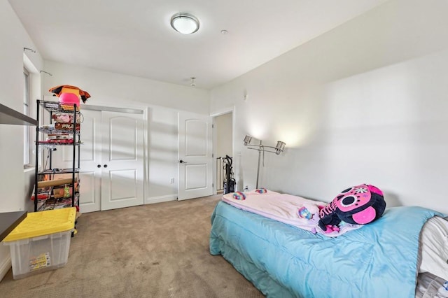 bedroom with light colored carpet