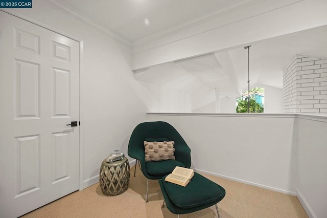 living area with crown molding, lofted ceiling, and carpet