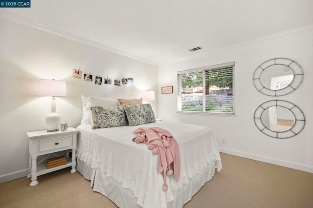 carpeted bedroom with ornamental molding