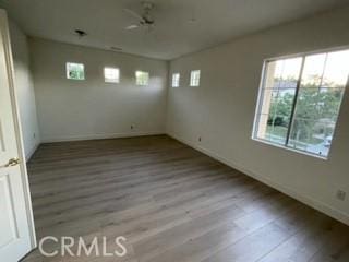 empty room with light wood-type flooring