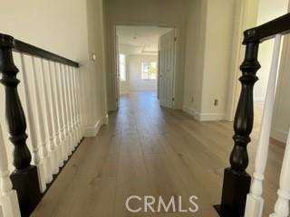 hallway featuring light hardwood / wood-style flooring