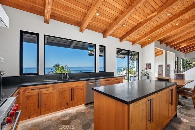 kitchen featuring wood ceiling, stainless steel appliances, sink, and lofted ceiling with beams