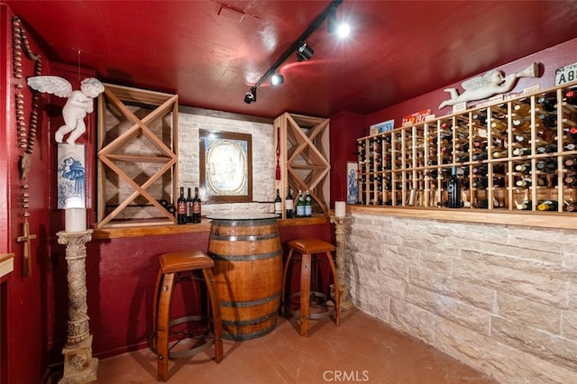 wine room with concrete floors